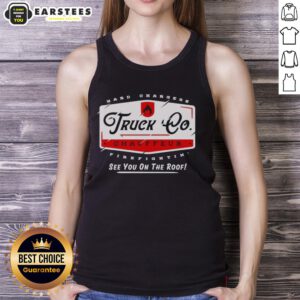 Alt Text: Hot truck chauffeur wearing a Hard Changers Firefightin' See You On The Roof tank top, ready for action.