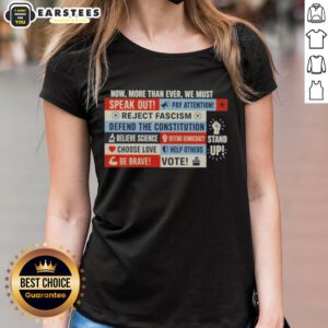 Feminist Ladies Tee featuring 'Nice, Now More Than Ever We Must' slogan in bold typography on a stylish shirt.