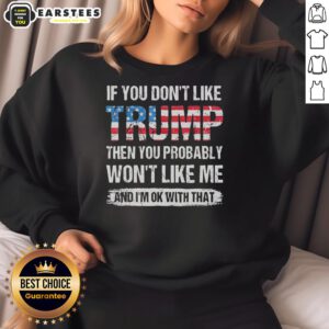 Alt Text: American flag pattern sweatshirt with text: 'If you don't like Trump, you probably won't like me' - bold statement fashion.