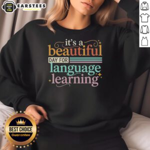 Vintage sweatshirt with 'Good, It's a Beautiful Day for Language Learning' design, perfect for language enthusiasts.