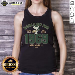 1969 Pretty Peanuts Music and Art Fair Snoopy tank top featuring colorful graphics and retro design.