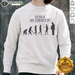 Funny Go Back We Screwed Up sweatshirt displayed in a cozy setting, perfect for casual wear.