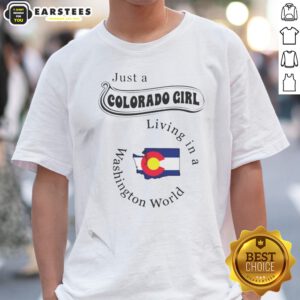 Original Just A Colorado Girl Living In A Washington World shirt displayed on a hanger in a bright setting