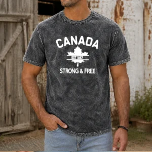 Hot Canada Est 1867 Strong & Free Maple Leaf design on a soft washed t shirt in vintage red