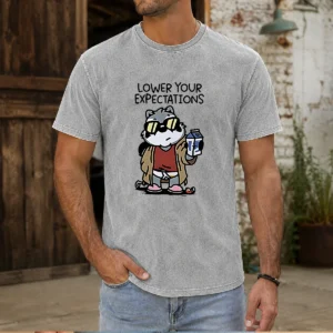 Official Lower Your Expectations Raccoon Cartoon Washed T Shirt featuring a soft vintage look and relaxed fit