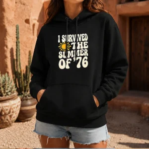 Pretty I Survived The Summer Of 76 1976 Vintage Hoodie in dark grey, front view with printed retro design