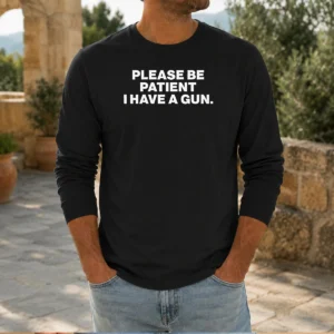 Pretty Please Be Patient I Have A Gun Quote Long Sleeve Shirt with bold text design on front, comfortable cotton fabric